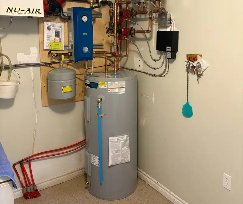 Electric boiler and hot water equipment installed by Backman Heating & Cooling for a Halifax homeowner