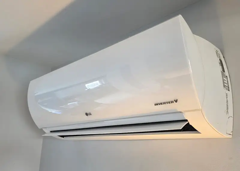 A clean, well-maintained heat pump head unit serviced by Backman